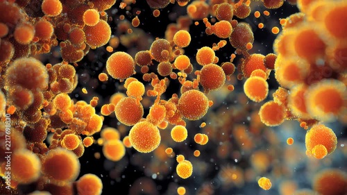 Orange microcells floating in a biological environment in the style of science