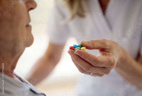  Nurse caring for elderly people