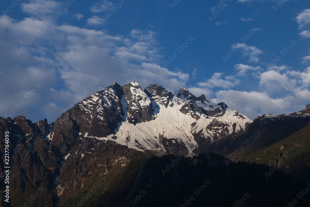 Obraz premium Waking up in Kyirong Town to the morning light kissing the sharp ridges of the Himalayas. It’s easy to see why explorers have called this the Secret Garden of Tibet for centuries
