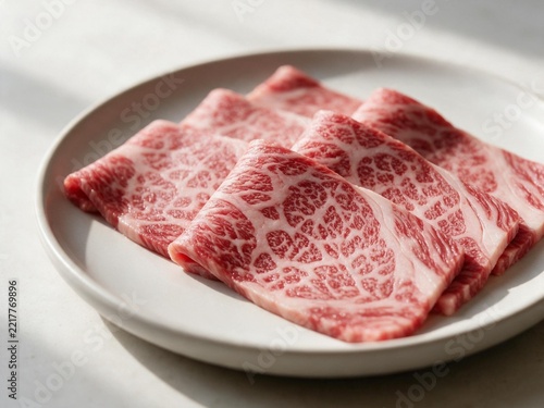 Raw wagyu slices on the plate