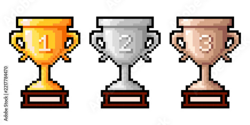 Pixel art trophy cup set. Pixelated vector illustration of gold, silver, and bronze game rewards. Retro 8 bit pixel assets for game