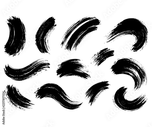Collection of curved black ink brush swooshes