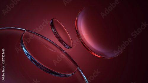 Macro close up of clear liquid bubbles floating in dark red fluid medium