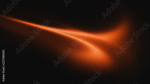 Abstract orange glowing light streak with grainy texture on dark black background