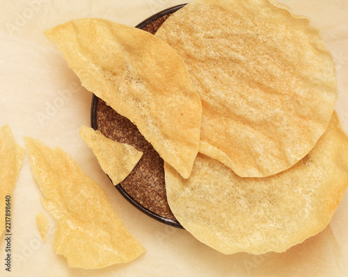 Poppadum crispy indian flatbread on a plate