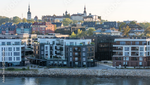 Toompea Castle and Dome Church above modern apartment blocks of Kalaranna, Tallinn, aerial view, Estonia