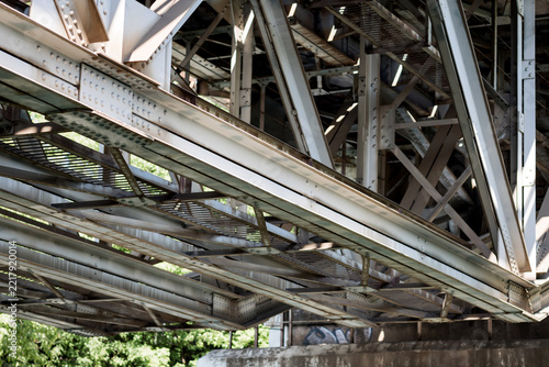 girders beneath a railway or road bridge
