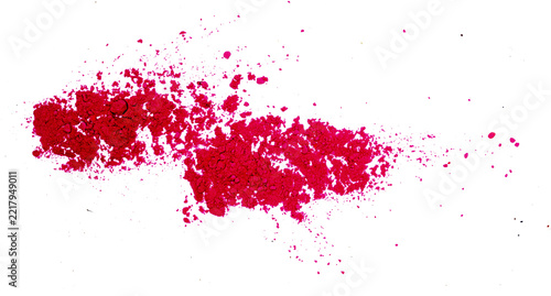 Fotografie Vivid red and pink pigment powder heap on textured paper in white background, pn