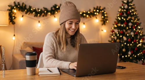 Modern remote worker staying productive during the festive holiday season.