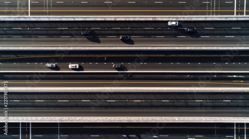 Aerial view of a road captured from above. Modern transportation landscape ideal for travel, infrastructure, logistics and navigation concepts.