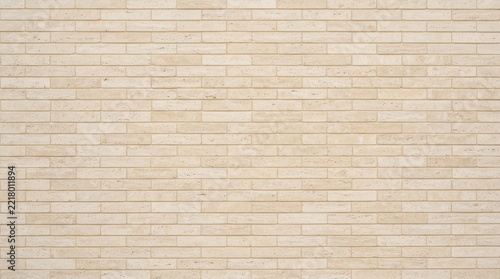 Pale beige brick wall texture background pattern
