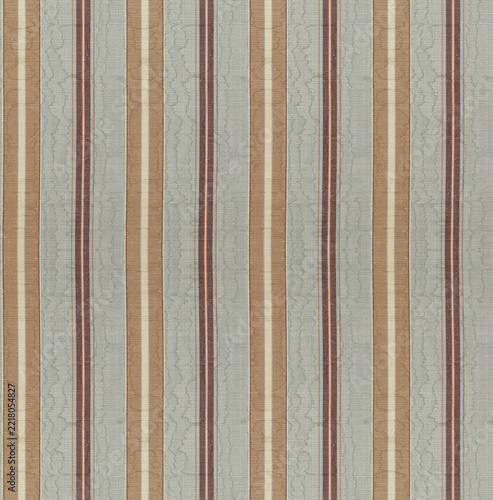 Close-up gray striped fabric texture with vertical stripe pattern, shown as a flat square background.
