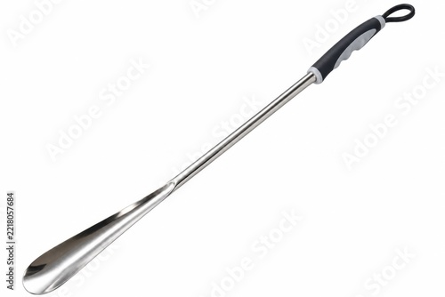 Long Metal Shoe Horn With Black Handle On White Background