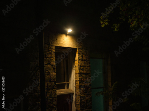 Warm outside light outside building window