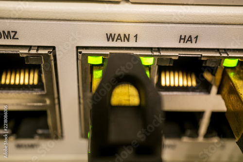 Firewall Network Ports WAN DMZ HA Close-Up with Green LED