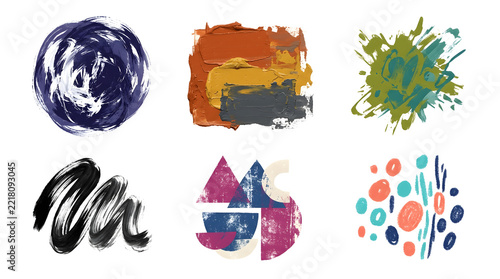 Collection of abstract watercolor brush strokes isolated against a dark black background
