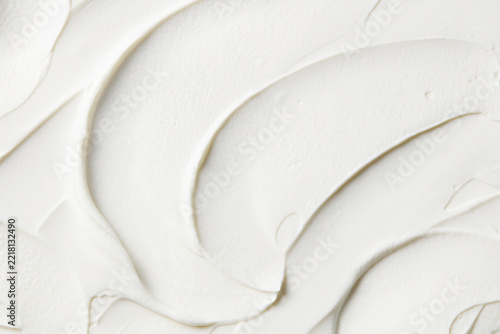 White texture waves background for cosmetic beauty branding, interior renovation or cake frosting. Close up. Top view.