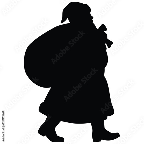 Walking santa claus silhouette carrying a large sack of presents for christmas holiday.