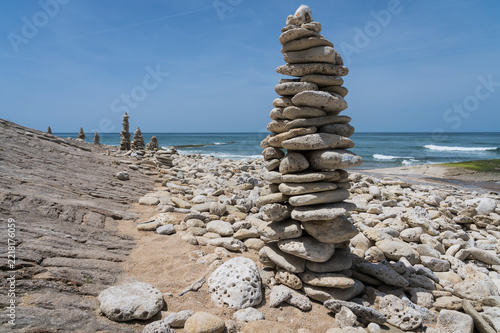 Stone stacks on the beach of Ile de Re.