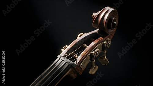 Close-up of violin scroll and tuning pegs on black background