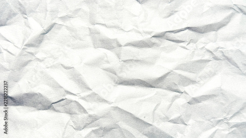 Light gray crumpled paper texture background featuring heavy creases, folds and rough surface grain