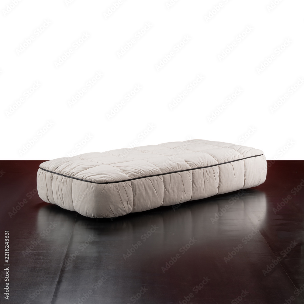 Fototapeta premium designer bed with a padded structure with a distinctive removable quilted covering.