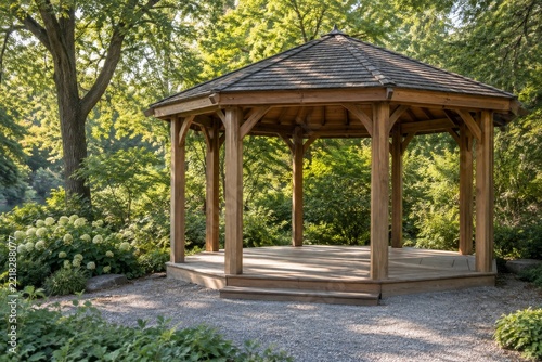 Empty timber pavilion in a sunlit green park