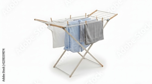 Laundry drying on a wooden folding rack against a clean white background in the studio with hang collapsible drying