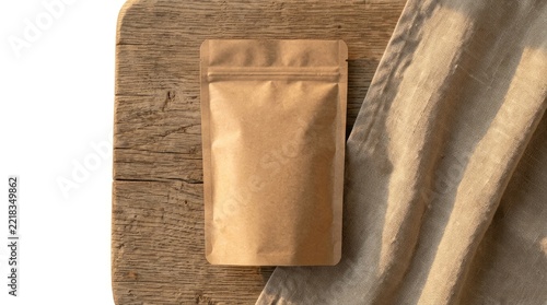 Kraft paper stand up pouch on wooden board.