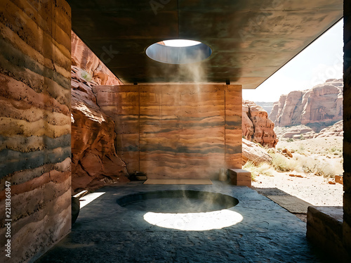 Modern outdoor hot tub nestled in red rock desert canyon with natural