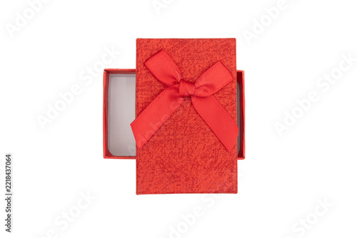 Open red gift box with satin bow isolated on transparent PNG