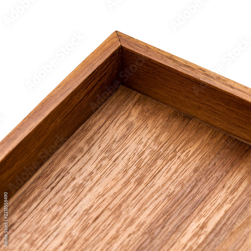 Teak tray mitred corner macro crop showing upstand and base panel joint on a transparent background