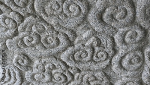 Korean Traditional Cloud Pattern Carved on Gray Stone Surface