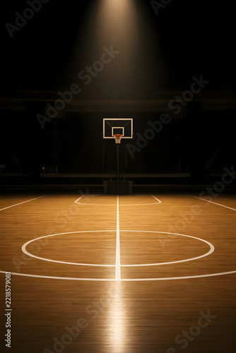 Empty basketball arena with white court lines