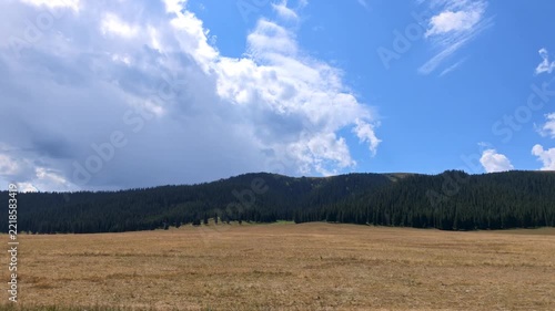 Dry Meadow Beneath a Forested Ridge and Blue, Xinjiang Province, China