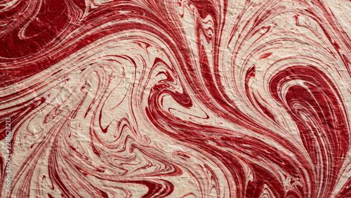 Red and Cream Marbled Wrapping Paper Swirls Background