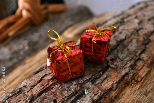 red christmas deco on firewood background  - merry christmas background - christmas card background 