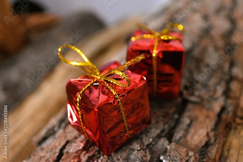 red christmas deco on firewood background  - merry christmas background - christmas card background 