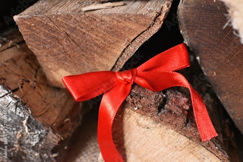 red christmas deco on firewood background  - merry christmas background - christmas card background 
