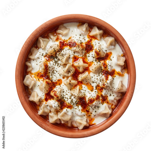 Traditional Turkish manti dumplings served with garlic yogurt sauce and spicy chili butter on transparent background