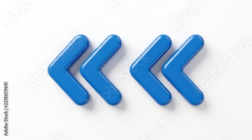 Two glossy blue chevron arrow symbols isolated on white background