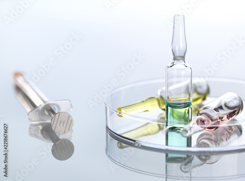 Ampullae in petri dish, syringe