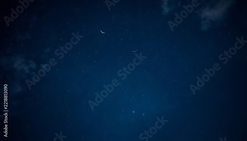 Deep blue night sky background with stars, celestial galaxy texture with faint clouds, dark navy cosmic space atmosphere