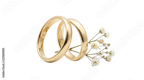 Two intertwined golden wedding rings with delicate white flowers, symbol of love and commitment, isolated on transparent background