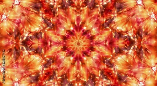 Vibrant kaleidoscopic mandala with red, orange and gold starburst petals radiating crystalline, glowing symmetry