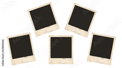 A collection of five blank vintage instant photo frames arranged in a circular pattern presented as an isolated object on a transparent background isolated on transparent background