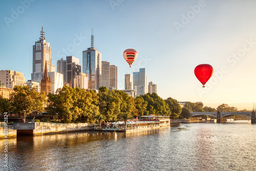 Sunrise over Melbourne with Balloons above the City