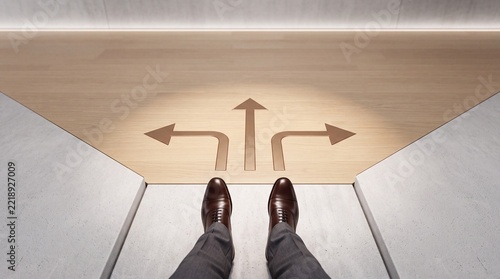 Businessman Standing at a Crossroads with Three Directional Arrows on Wooden Floor Representing Career Path Choice, Strategic Decision Making, and Future Business Growth Opportunities