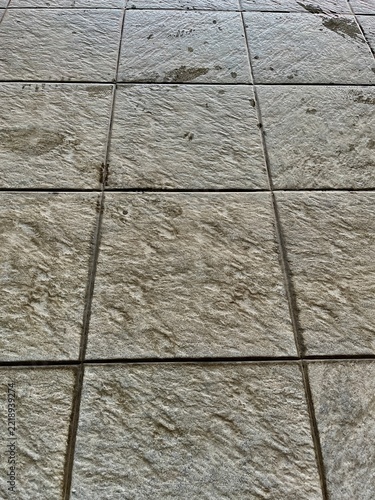 Textured Grey Stone Outdoor Floor Tiles Pattern Background for Architectural and Exterior Design