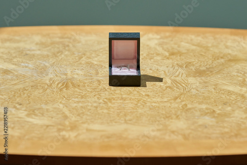 Close Up Of Two Wedding Rings In Box On Table At Registry Office Ceremony